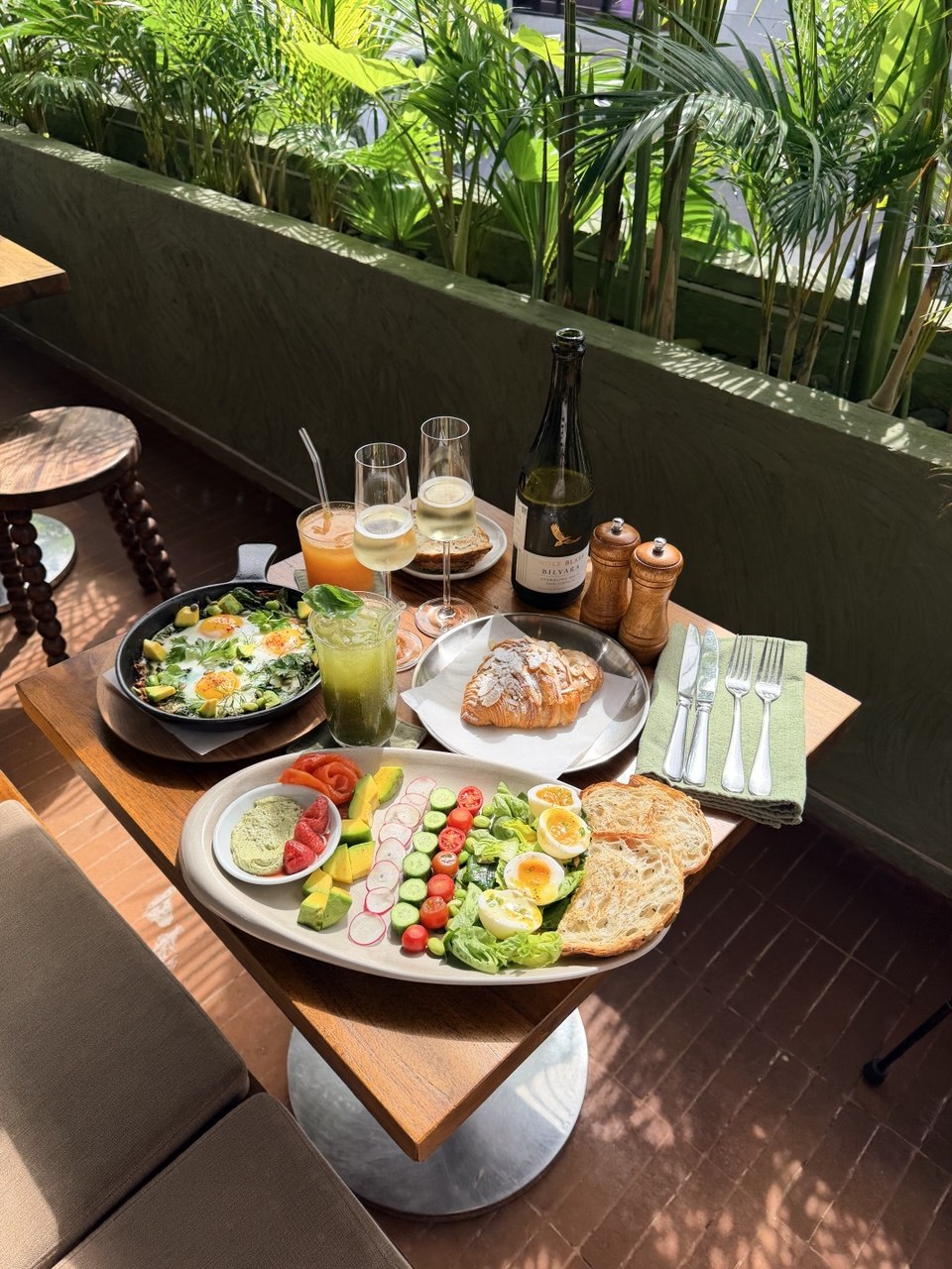 Breakfast at AVA Bistro — eggs, avocado, coffee