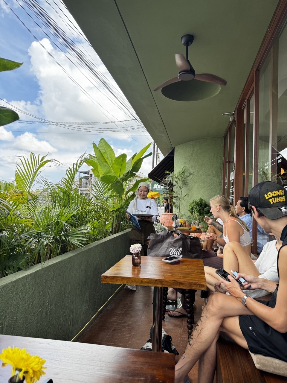 Candle-lit terrace at AVA Bistro in Seseh, Bali — European dinner service